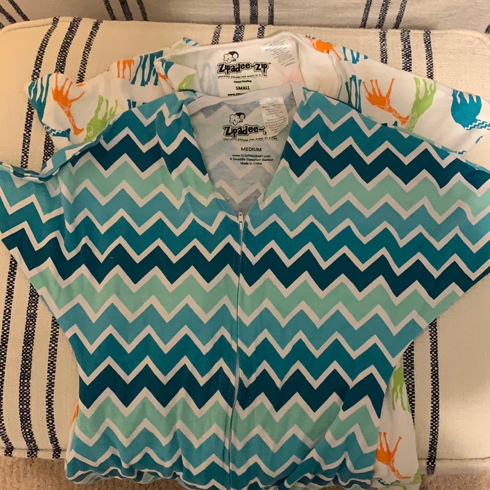 TWO zipadee-zip suits, one S, one M, never worn!